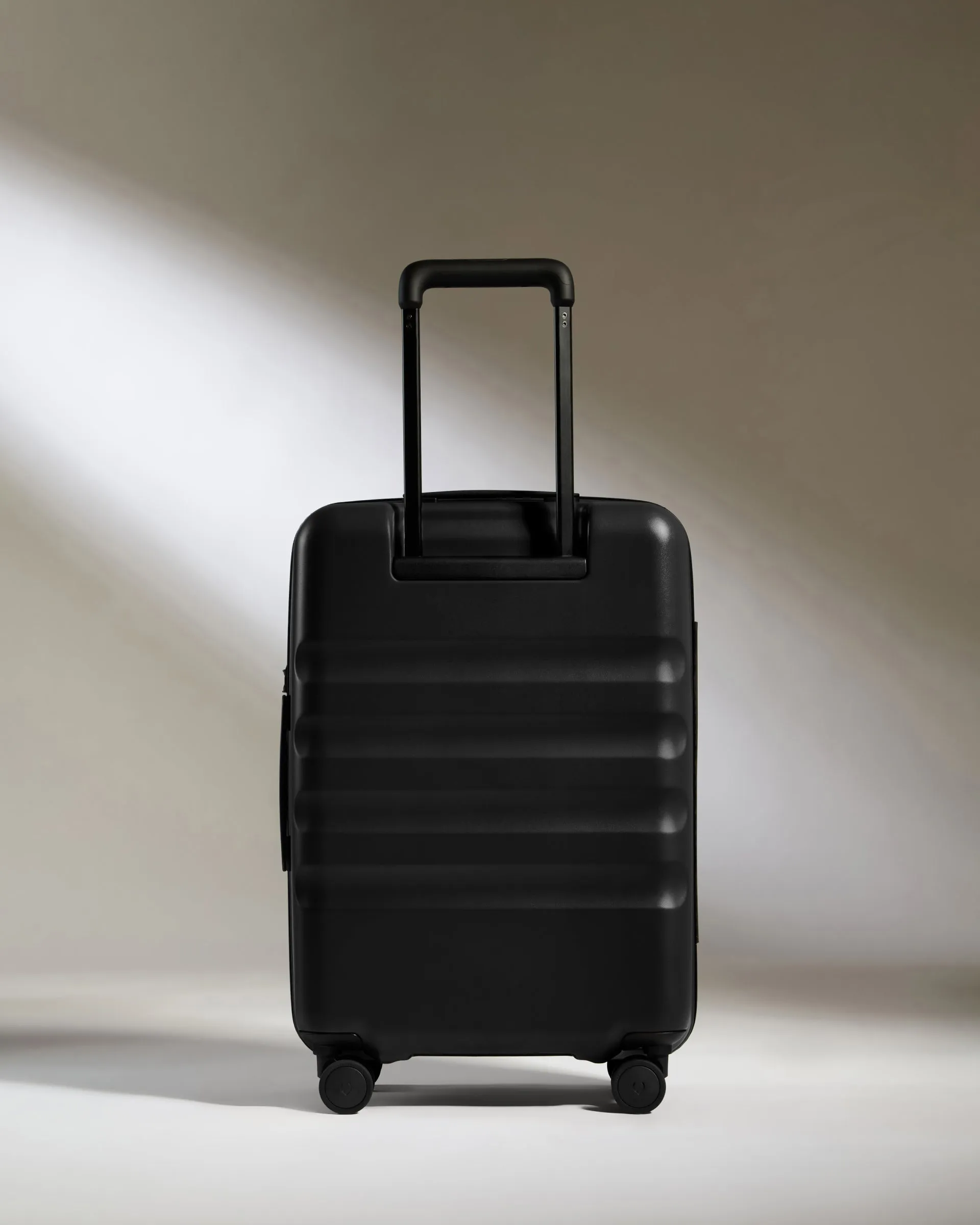 Large Cabin Suitcase in Black - Icon Stripe