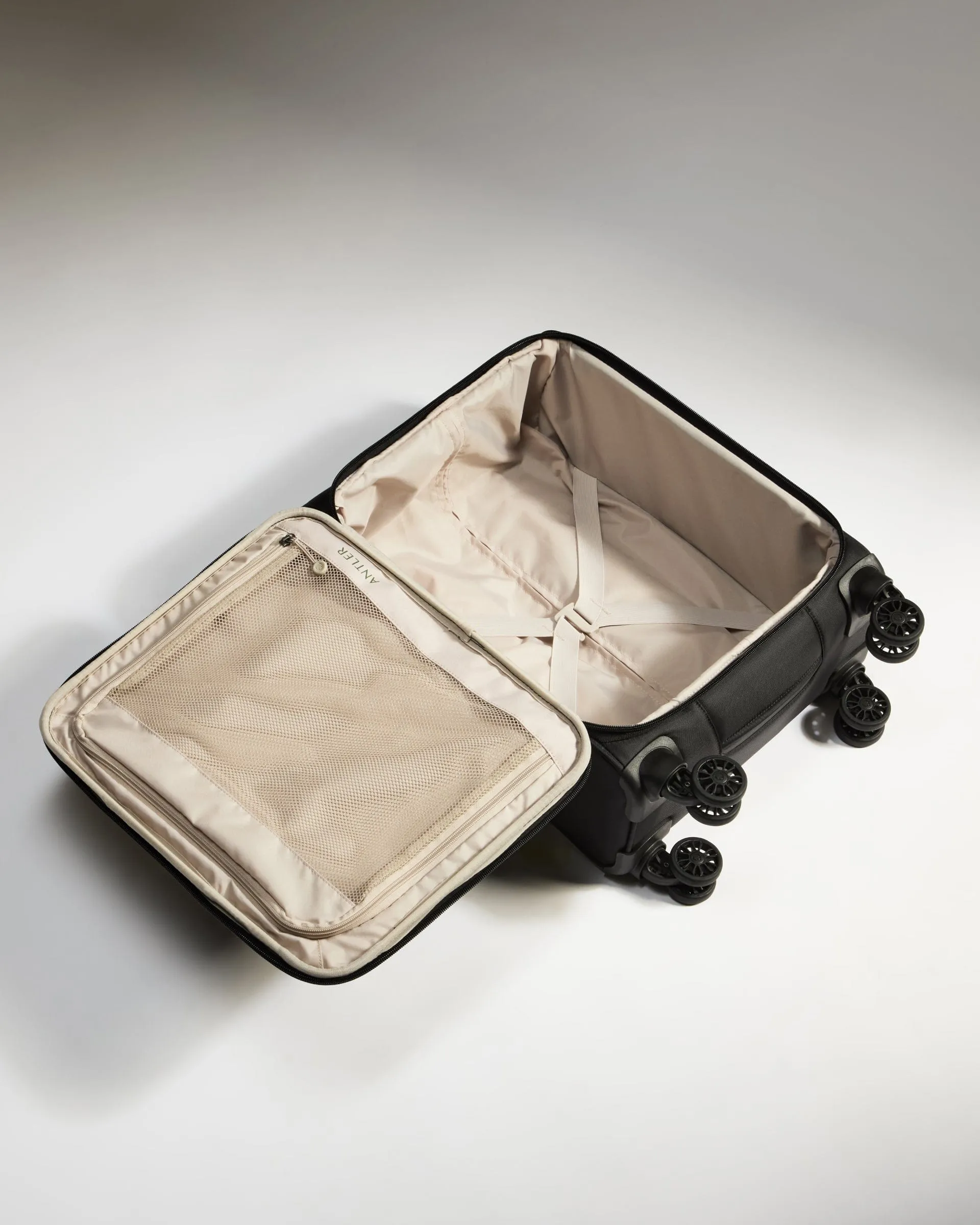 Lightest Cabin Suitcase in Black - Soft Stripe